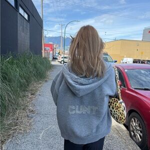 C*nt grey zip up